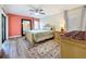 Bedroom features a ceiling fan, wood floors, and furnishings at 300 S Florida Ave # 600L, Tarpon Springs, FL 34689