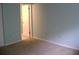 A well-lit bedroom with plush carpeting and ample space at 3077 Casa Del Sol Cir # 207, Clearwater, FL 33761