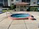 Close-up of the community spa with seating and a gazebo, perfect for relaxing and unwinding at 3077 Casa Del Sol Cir # 207, Clearwater, FL 33761