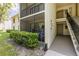 Charming condo with a private screened-in porch and convenient access to stairs at 3114 Lake Pine Way # G1, Tarpon Springs, FL 34688