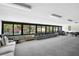 Large common room with lots of seating and lots of natural light at 3211 W Swann Avenue # 707, Tampa, FL 33609