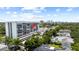 Upscale condominium building with city views and surrounded by mature trees and manicured landscaping at 3211 W Swann Avenue # 707, Tampa, FL 33609
