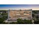 Stunning condominium building featuring multiple stories and large windows with cityscape views at 3211 W Swann Avenue # 707, Tampa, FL 33609