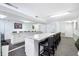 Kitchenette features granite countertops, modern appliances, and bar seating at 3211 W Swann Avenue # 707, Tampa, FL 33609