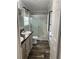 Bathroom with a double vanity and shower at 3221 Roxborough Ave, Clearwater, FL 33762