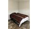 Bedroom with wood floors and neutral walls at 3221 Roxborough Ave, Clearwater, FL 33762