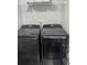 Modern laundry room featuring high-end Samsung washing and dryer units at 3221 Roxborough Ave, Clearwater, FL 33762