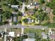 Aerial view of the neighborhood showing the property's location, street, and surrounding houses at 37045 North Ave, Dade City, FL 33523