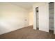 Bedroom showcasing a closet with sliding doors and white trim throughout at 37045 North Ave, Dade City, FL 33523