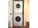 Convenient laundry area with stacked washer and dryer appliances at 37045 North Ave, Dade City, FL 33523