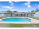 Backyard with a pool and screened in patio provides ample outdoor living space at 3917 Casaba Loop, Valrico, FL 33596