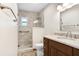 Bathroom features a stand-up shower, vanity with a sink and a toilet at 3917 Casaba Loop, Valrico, FL 33596