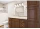 Bathroom featuring a stand-up shower, vanity with a sink and cabinet space at 3917 Casaba Loop, Valrico, FL 33596