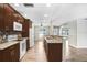 Well-equipped kitchen featuring stainless steel appliances and open access to the living area, perfect for gatherings at 3917 Casaba Loop, Valrico, FL 33596