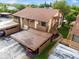 Aerial view showcases a townhome with covered parking, patio, and well maintained landscaping at 4036 Davit Dr, New Port Richey, FL 34652