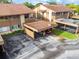 Townhome featuring assigned covered parking and an adjacent lawn at 4036 Davit Dr, New Port Richey, FL 34652
