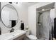 Bathroom with a new shower, vanity, sink, mirror and toilet at 4036 Davit Dr, New Port Richey, FL 34652