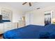 Bedroom with a dresser, ceiling fan and closet at 4036 Davit Dr, New Port Richey, FL 34652