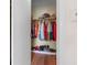 Bedroom closet with wood floor, rod and shelf at 4036 Davit Dr, New Port Richey, FL 34652