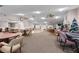 Spacious clubhouse featuring ceiling fans, game tables, neutral colors, and ample room for gatherings at 4036 Davit Dr, New Port Richey, FL 34652
