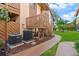 Exterior side view of townhome featuring a private back entrance and stairway at 4036 Davit Dr, New Port Richey, FL 34652