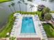 Aerial view of the community pool area with chairs and spa at 4036 Davit Dr, New Port Richey, FL 34652