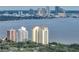 Beautiful waterfront view showcasing two luxurious high-rise buildings, surrounded by lush greenery at 4221 W Spruce St # 2302, Tampa, FL 33607