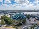 High aerial view showcases skyline, port, and a unique aquarium with its striking glass architecture at 4221 W Spruce St # 2302, Tampa, FL 33607