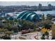 Picturesque aerial view of an aquarium's unique glass architecture in a lively city and port setting at 4221 W Spruce St # 2302, Tampa, FL 33607