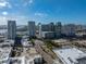 Stunning aerial view showcases the city skyline and bay views on a beautiful sunny day at 4221 W Spruce St # 2302, Tampa, FL 33607