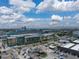 Expansive aerial view showcasing a cruise ship at port under a partly cloudy sky at 4221 W Spruce St # 2302, Tampa, FL 33607