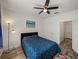 Inviting bedroom with a ceiling fan and a soothing atmosphere, perfect for rest and relaxation at 4221 W Spruce St # 2302, Tampa, FL 33607