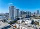Breathtaking city view features modern high-rise buildings, parking garages, and lush greenery at 4221 W Spruce St # 2302, Tampa, FL 33607