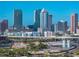 Cityscape featuring towering buildings, a bustling highway, and the beginning of a construction project at 4221 W Spruce St # 2302, Tampa, FL 33607