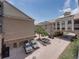 Exterior view of a modern residential complex with landscaped grounds and ample parking at 4221 W Spruce St # 2302, Tampa, FL 33607