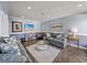 Community lounge features sofas, modern tables, and TVs at 4221 W Spruce St # 2302, Tampa, FL 33607