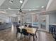 Comfortable lounge area for residents to socialize, with a view of the pool and outdoor areas at 4221 W Spruce St # 2302, Tampa, FL 33607