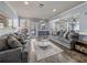 Community lounge features sofas, modern tables, doors and mirrors at 4221 W Spruce St # 2302, Tampa, FL 33607