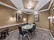Private meeting room featuring an oval table, modern lighting, and neutral decor at 4221 W Spruce St # 2302, Tampa, FL 33607