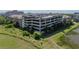 Modern parking garage offers ample parking for residents, situated near lush landscaping at 4221 W Spruce St # 2302, Tampa, FL 33607