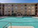 The pool has a clear blue swimming area at 4221 W Spruce St # 2302, Tampa, FL 33607