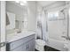 Clean bathroom featuring a gray vanity with a marble countertop and neutral decor at 4633 Ballantrae Blvd, Land O Lakes, FL 34638