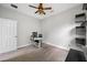 A clean, comfortable bedroom with a ceiling fan and a practical layout for working at 4633 Ballantrae Blvd, Land O Lakes, FL 34638