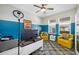 Bright office with colorful accents and large windows offering natural light at 4633 Ballantrae Blvd, Land O Lakes, FL 34638