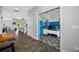 View of the office with bright blue accents and a view to living area at 4633 Ballantrae Blvd, Land O Lakes, FL 34638