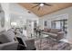 Spacious living room with contemporary decor, open layout, and direct access to the pool at 4706 Fox Hunt Dr, Tampa, FL 33624