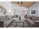 Open concept living room featuring wood-paneled ceiling with an inviting dining area at 4706 Fox Hunt Dr, Tampa, FL 33624
