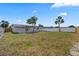 Large backyard with grass and privacy fence at 4803 Sierra Madre Dr, Tampa, FL 33634