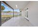 Covered patio featuring white walls and tiled floor at 4803 Sierra Madre Dr, Tampa, FL 33634