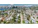 Beautiful aerial view of a residential area with streets, homes and a beach on the horizon at 503, 509, Cottage, Land 69Th Ave, St Pete Beach, FL 33706